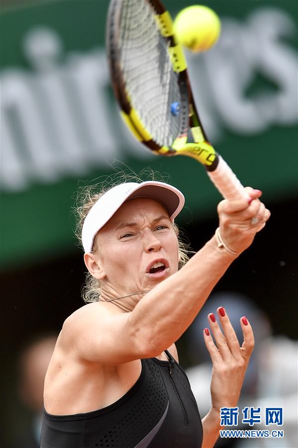 （体育）（4）网球——法网：沃兹尼亚奇晋级第二轮