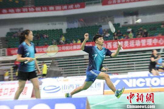 羽毛球选手在比赛中。主办方供图