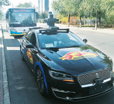 百度在京开放自动驾驶体验服务引关注，记者实地探访——“人工智能老司机”长什么样？